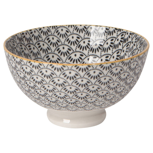Decorative ceramic bowl with black and white pattern on a white background.