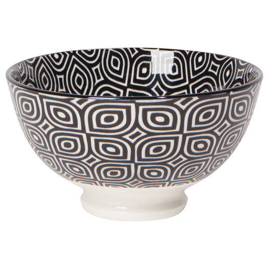 Ceramic bowl with black and white geometric pattern on a white background